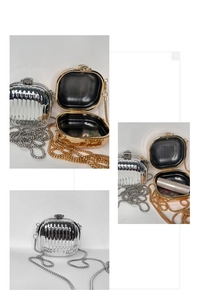Detailed view of silver and gold acrylic evening bags with chain and lipstick comparison