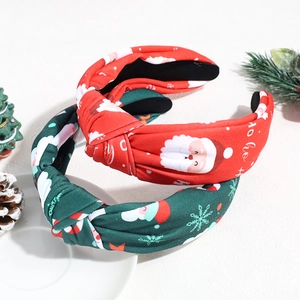 Christmas knotted headbands with Santa Claus and snowflake prints in red and green colors