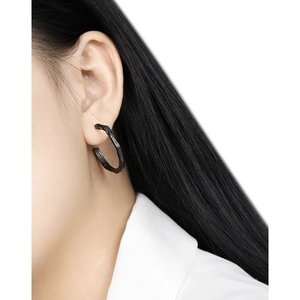Irregular rock texture black hoop earrings with minimalist geometric design for women
