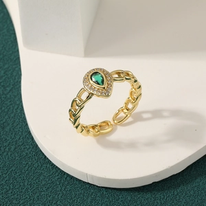 Gold plated open ring with pear shaped green zircon and hollow chain band design