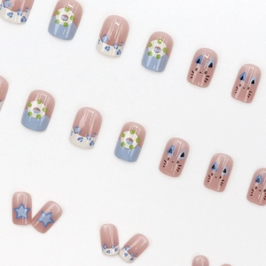 French blue leopard cat-style press-on nails with glossy blue star and floral patterns