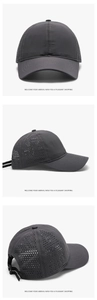 Detail of dark grey baseball cap featuring laser-cut ventilation holes and adjustable strap