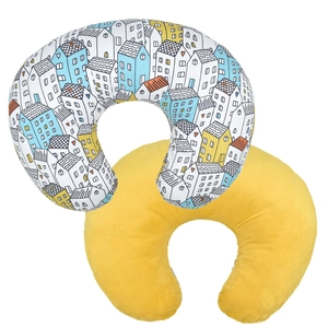 Detail showing cartoon house pattern and soft yellow plush velvet U-shape nursing pillow cover