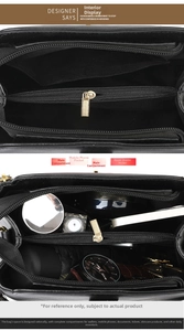 Interior view showing spacious compartments and zip pocket of this black tote bag