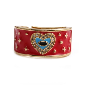 Anello a cuore dorato con smalto blu occhio del diavolo e cristalli di zirconia