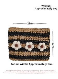 Detail of striped crochet straw envelope bag with three white 3D flower accents