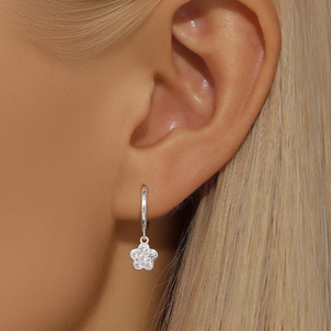 Close-up of model wearing S925 silver flower drop earrings with micro-set zircon crystals