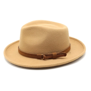 Close-up of camel wool fedora hat featuring a brown leather belt with a golden buckle