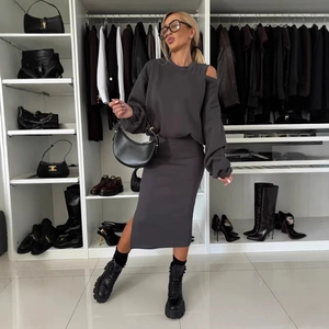 Women's dark gray knit set with off-shoulder sweatshirt and side slit midi skirt
