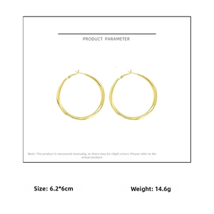 Detailed view of large gold hoop earrings with dimensions 6.2x6cm and 14.6g weight