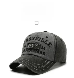 Detailed embroidery on vintage washed denim baseball cap with star stitching and text