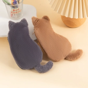 Detail of plush cat pencil case in grey and brown colors showing soft faux fur texture