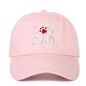 Pink cotton baseball cap with Dog Dad embroidery and paw print for pet owners