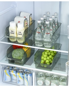 Macro detail of gray transparent fridge storage box with U-shaped opening design