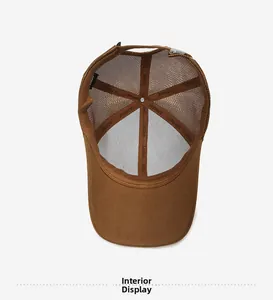 Interior view of brown mesh trucker hat showing FDMY tape lining and breathable structure