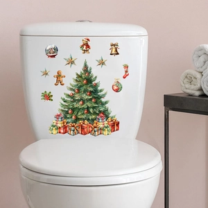 Detailed Christmas tree and gift box wall stickers applied on a white bathroom surface