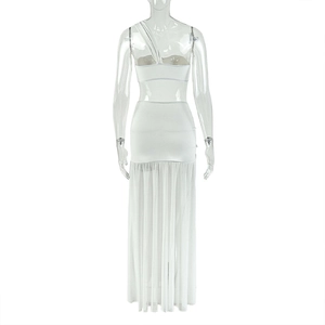 Detail of white one-shoulder mesh dress featuring an open back and semi-sheer skirt