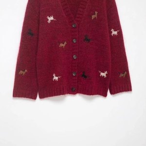 Women's burgundy knit cardigan with V-neck and colorful animal embroidery pattern