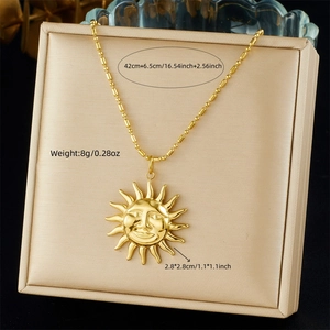Macro view of gold sun pendant with measurements 2.8cm and 42cm bead chain length