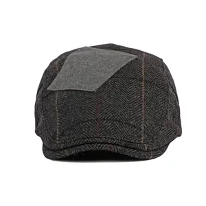Classic dark grey herringbone wool flat cap with vintage patchwork and british style