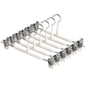 Set of 10 beige non-slip stainless steel pants hangers with adjustable metal clips