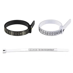 Juego de medidores de anillos portátiles en plástico flexible blanco y negro tallas US 1-17