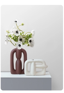 Detail of modern abstract ceramic vases with matte finish for stylish home decor