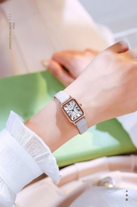 Close-up of GEDI elegant rectangular watch with Roman numerals and grey leather strap