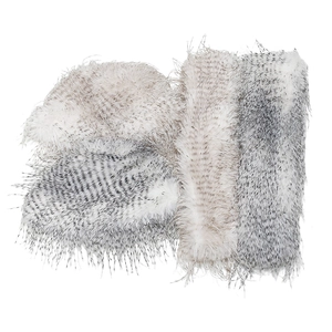 Detailed view of high-quality faux fur accessories with black and white spotted feather texture