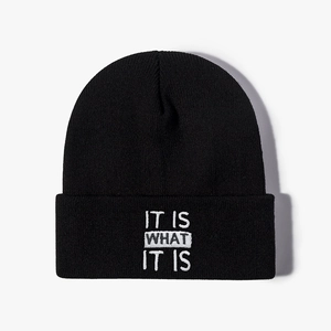 Black knit beanie with IT IS WHAT IT IS white embroidery for winter casual wear