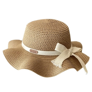 Kids woven straw sun hat with white ribbon bow decoration for summer beach wear