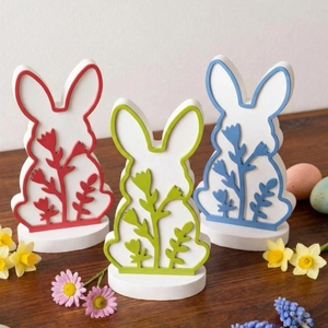 Three-piece Easter bunny desktop ornaments with floral relief and round base display