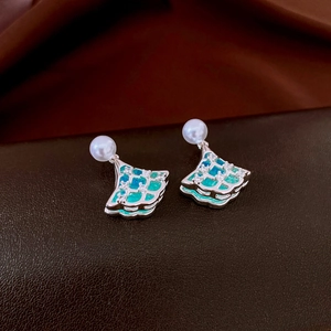 Detail of ginkgo leaf earring with pearl stud, blue-green enamel and sparkling zircon