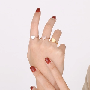 Adjustable minimalist heart-shaped stainless steel rings in silver, rose gold, and gold