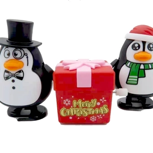 Three-piece Christmas wind-up toy set with penguins and red Merry Christmas gift box