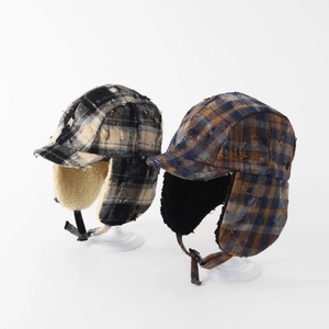 Winter plaid trapper hat for kids with warm sherpa lining and ear flaps in two colors