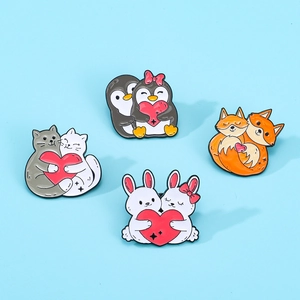 Cartoon animal enamel pin set featuring cats, foxes and penguins with red hearts on blue background