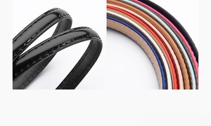 Detail of colorful slim leather belts with professional double stitching and polished finish