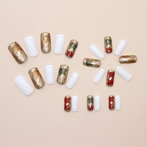 Autumn style press-on nails set featuring vintage red maple leaf patterns and white tips
