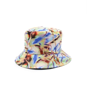 Reversible bucket hat featuring abstract colorful marble print and reinforced brim stitching