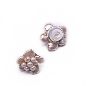 Elegant baroque pearl flower stud earrings with gold accents on a clean white background