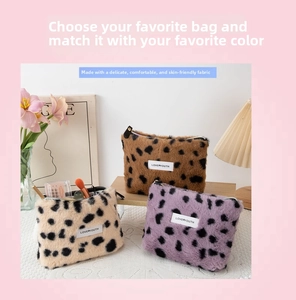Detailed macro view of soft leopard print plush cosmetic bag with Love Youth brand label
