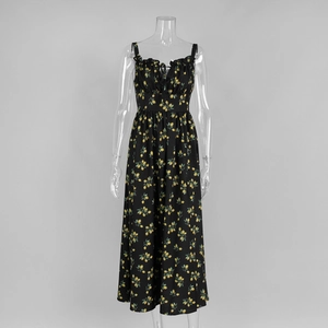 Detail of floral spaghetti strap dress with yellow lemon print and shirred bodice