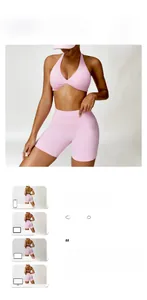 Pink yoga set detail showing halter neck sports bra and high waist biker shorts on model