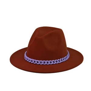 Close-up of brown wool fedora hat featuring a stylish lavender chunky chain decoration