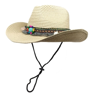 Ethnic straw cowboy hat with turquoise stone and beaded band for summer beach sun protection