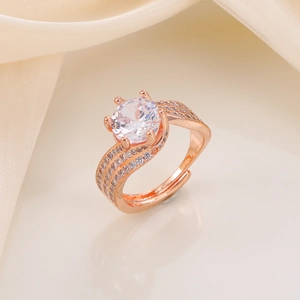 Detail of rose gold open ring with a 3-carat round zircon and triple-row pavé crystals