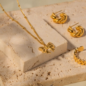 18K gold plated stainless steel jewelry set with butterfly pendant, hoops and leaf ring