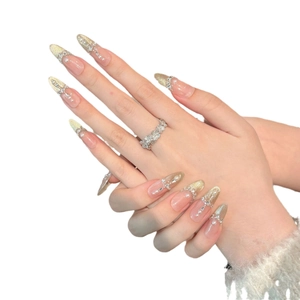 Luxury handmade press-on nails in long almond shape with pink cat eye and pearl accents