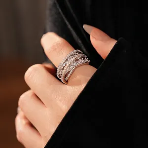 Luxe multilayer crisscross ring with zircons in silver finish for a minimalist style